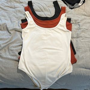 Ribbed Bodysuits